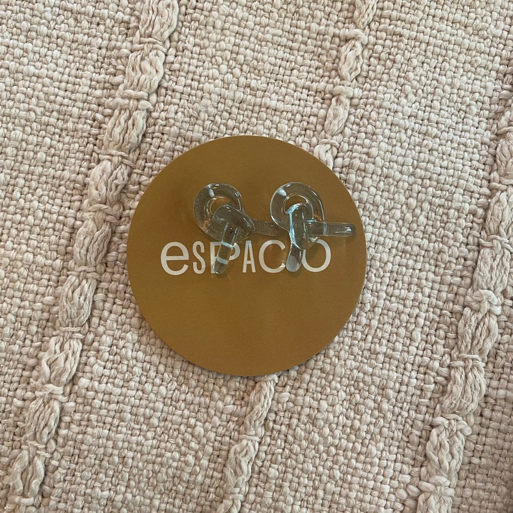 NWT. ESPACIO Pop Up Shop - lightweight aqua acrylic knot earrings